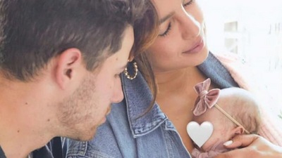 Priyanka Chopra and Nick Jonas with their daughter Malti. Priyanka Chopra and Nick Jonas with their daughter Malti.