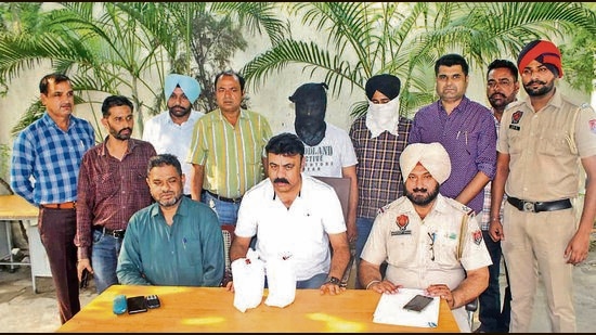 The accused in custody of Ludhiana police. One of them is a realtor and the other, a farmer. (HT Photo) The accused in custody of Ludhiana police. One of them is a realtor and the other, a farmer. (HT Photo)
