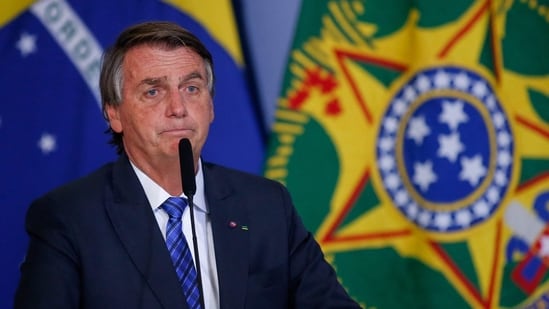 Brazil's President Jair Bolsonaro had not planned to attend the summit until Biden sent an envoy to convince him to come with the offer of a bilateral meeting.(AFP)