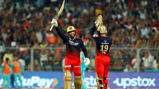 Rajat Patidar of Royal Challengers Bangalore raises his bat after scoring a century against Lucknow Super Giants(IPL) Rajat Patidar of Royal Challengers Bangalore raises his bat after scoring a century against Lucknow Super Giants(IPL)