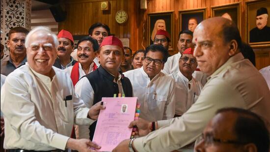 Former Congress leader Kapil Sibal files his nomination papers for Rajya Sabha with the support of the Samajwadi Party, at Vidhan Bhawan in Lucknow, on Wednesday, May 25, 2022. (PTI) Former Congress leader Kapil Sibal files his nomination papers for Rajya Sabha with the support of the Samajwadi Party, at Vidhan Bhawan in Lucknow, on Wednesday, May 25, 2022. (PTI)