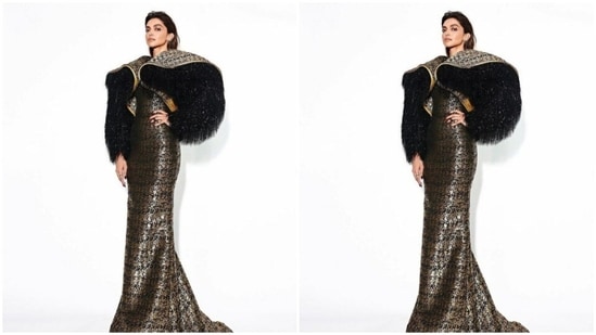 Deepika played muse to fashion designer house Louis Vuitton and picked an elaborate black and gold gown for the red carpet.(Instagram/@deepikapadukone)