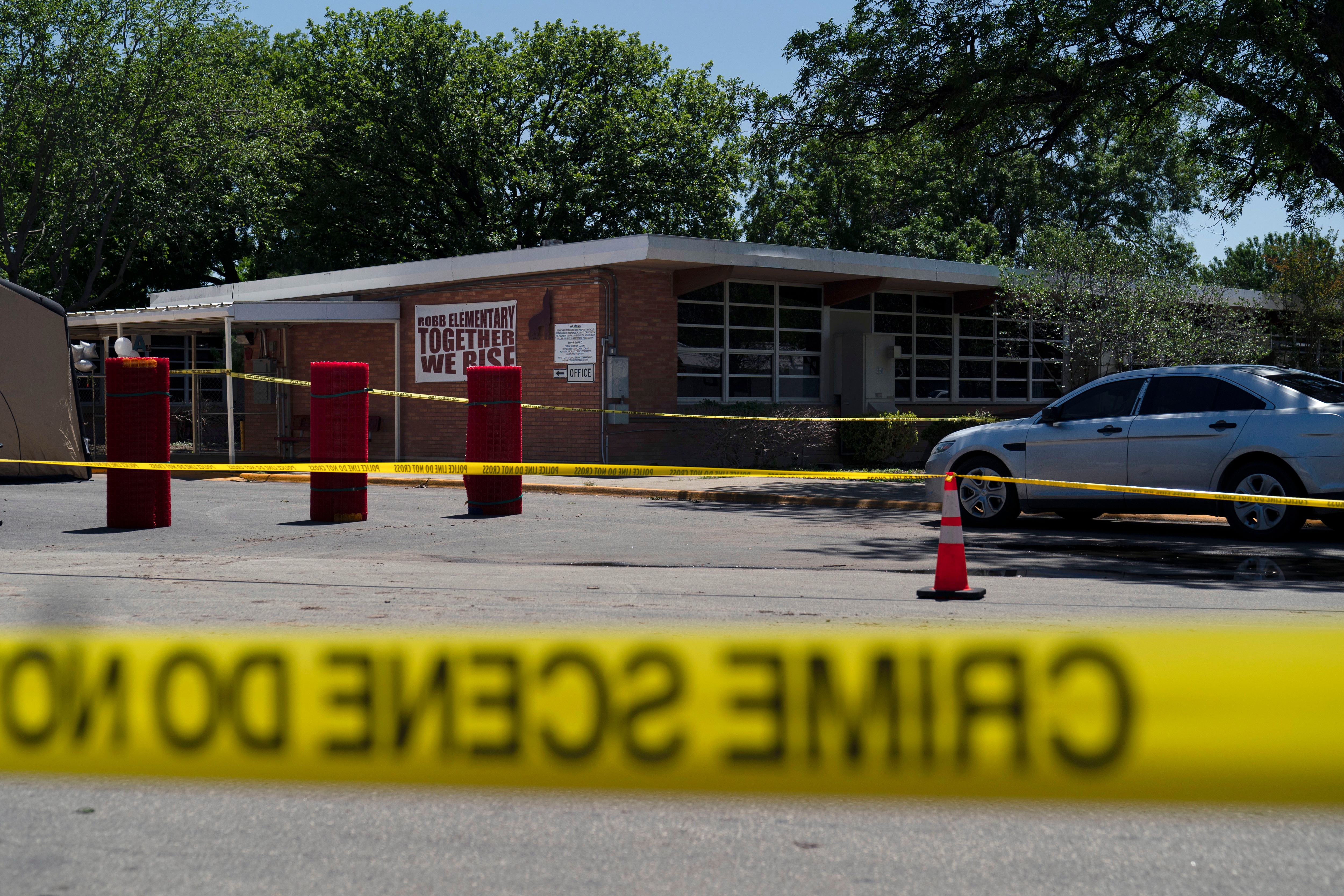 Crime scene tape surrounds Robb Elementary School in Uvalde, Texas, on May 25, 2022. (AP) Crime scene tape surrounds Robb Elementary School in Uvalde, Texas, on May 25, 2022. (AP)