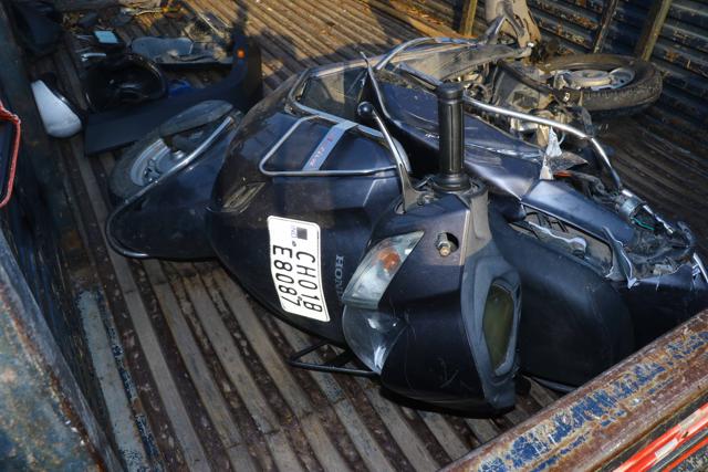 The mangled remains of the victim’s scooter. (Keshav Singh/HT)