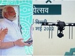 PM Narendra Modi tried his hand at flying a drone during the inauguration of two-day Bharat Drone Mahotsav 2022 at Pragati Maidan in Delhi(Twitter/ANI)