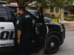 UVALDE, TX - MAY 24: Uvalde Police gather outside the home of suspected gunman 18-year-old Salvador Ramos on May 24, 2022 in Uvalde, Texas. (AFP) UVALDE, TX - MAY 24: Uvalde Police gather outside the home of suspected gunman 18-year-old Salvador Ramos on May 24, 2022 in Uvalde, Texas. (AFP)