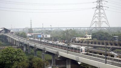 A Metro train leaves the Hindon River station in Ghaziabad. Residents are of the view that the Metro is the need of the hour. (Sakib Ali/ HT)