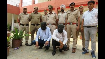 Two of the accused in the custody of Panchkula police. (HT Photo)