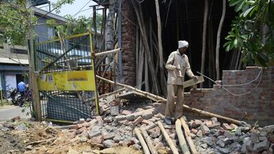 The Ludhiana MC team organised the demolition drive after receiving a complaint against the building being constructed in the residential area (HT PHOTO)