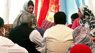 Jammu and Kashmir People's Democratic Party chief Mehbooba Mufti meets with family members of YouTuber Amreen Bhat, who was recently killed by terrorists on May 25, at her residence, Chadoora, in Budgam on Friday. (ANI) Jammu and Kashmir People's Democratic Party chief Mehbooba Mufti meets with family members of YouTuber Amreen Bhat, who was recently killed by terrorists on May 25, at her residence, Chadoora, in Budgam on Friday. (ANI)