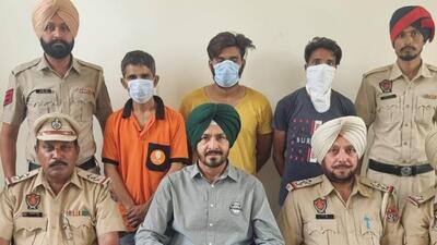 STF officials with three drug peddlers caught with heroin in separate cases, in Ludhiana on Friday. (HT Photo) STF officials with three drug peddlers caught with heroin in separate cases, in Ludhiana on Friday. (HT Photo)