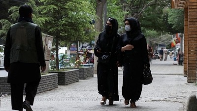 Afghan women walk on a street in Kabul, Afghanistan. (REUTERS)