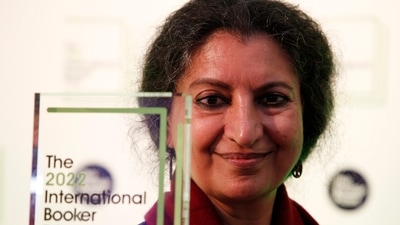 Author Geetanjali Shree poses with the 2022 International Booker Prize award for her novel 'Tomb of Sand' in London, Thursday. (AP)