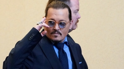 Actor Johnny Depp leaves the courtroom during a break at the Fairfax County Circuit Courthouse in Fairfax, Va., Monday, May 27, 2022. (AP Photo/Steve Helber, Pool) (AP)