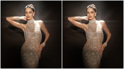 Ananya’s bodycon gown featured sleeveless and turtleneck details. The ochre gown came intricately decorated in silver sequins and hugged her shape perfectly. (Instagram/@ananyapanday)
