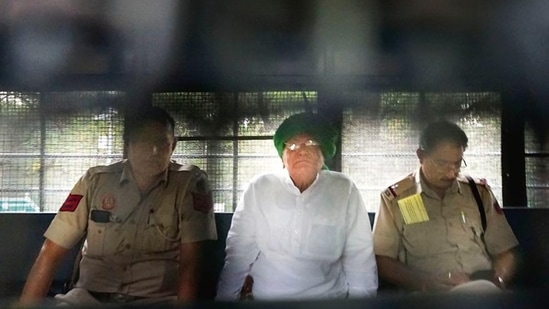 Former Haryana chief minister OP Chautala being taken to the Tihar Jail after a special CBI court sentenced him to four years in jail and imposed a fine of <span class='webrupee'>₹</span>50 lakh, in a case related to disproportionate assets, in New Delhi, Friday, May 27, 2022. (PTI Photo)