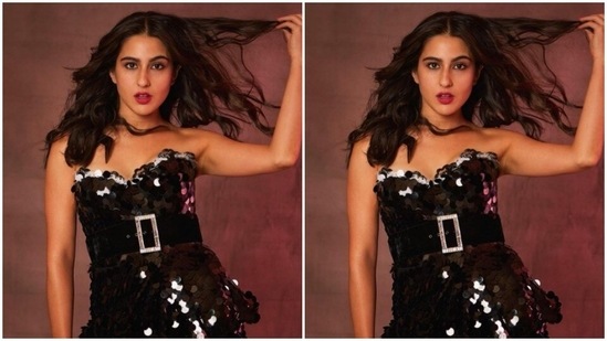Sara brushed our midweek blues away with a set of pictures featuring herself in a black sequined dress with off-shoulders and corset style details. The dress also featured a statement black belt with a silver buckle at the waist.(Instagram/@saraalikhan95)