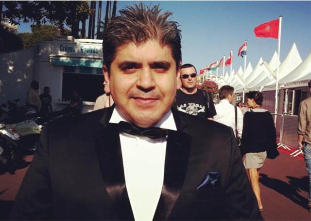 Rajeev Masand at Cannes in 2013, wearing a bow tie he had to buy at the last minute