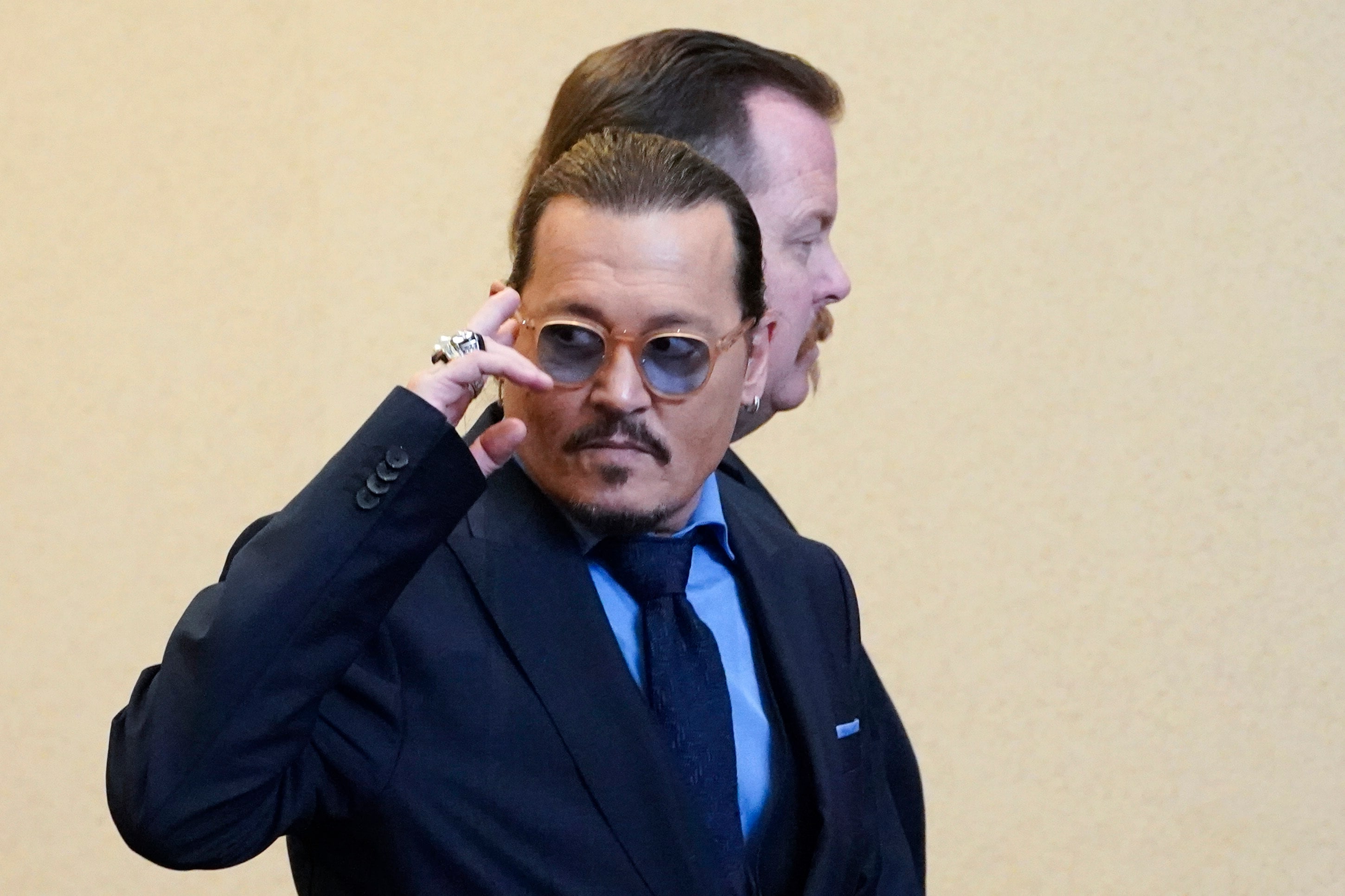 Actor Johnny Depp leaves the courtroom during a break at the Fairfax County Circuit Courthouse in May 2022. (AP)