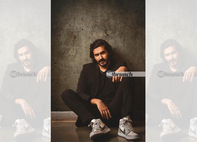 Harshvardhan says he recently bought a pair of ‘White Cement’ Supreme Dunk lows for $14,050 that he had always wanted to own. Now he has the complete Supreme Dunk set—three lows, three highs; Suit by YSL; Sneakers: Jordan 1 High x Dior (Subi Samuel)