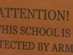 A board at the Utopia School District. (AFP)