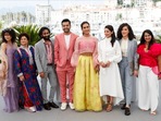 Director Saim Sadiq, cast members Alina Khan, Ali Junejo, Sarwat Gilani, Sania Saeed, Rasti Farooq and producers Apoorva Guru Charan and Sana Jafri pose in Cannes.