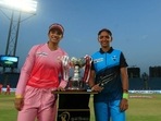 Smriti Mandhana (L) and Harmanpreet Kaur pose with the Women's T20 Challenge trophy.(IPL) Smriti Mandhana (L) and Harmanpreet Kaur pose with the Women's T20 Challenge trophy.(IPL)