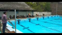 Athletes participating in the swimming trials at the Guru Nanak Stadium in Ludhiana on Saturday. (HT Photo)
