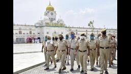 Punjab Police personnel on patrol outside the Golden Temple ahead of Operation Bluestar anniversary in Amritsar. The state police are on alert in view of the anniversary on June 6. (Sameer Sehgal/HT file)