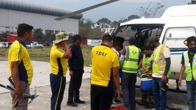 The Uttarakhand State Disaster Response Force (SDRF) has sent a High-Altitude Rescue team and a chopper to the area to launch a rescue operation on Saturday evening. (SDRF.) (HT_PRINT) The Uttarakhand State Disaster Response Force (SDRF) has sent a High-Altitude Rescue team and a chopper to the area to launch a rescue operation on Saturday evening. (SDRF.) (HT_PRINT)