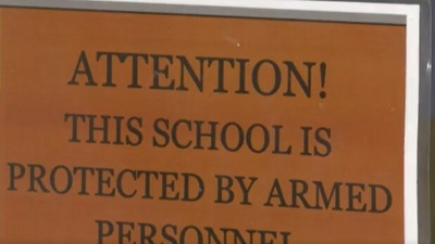A board at the Utopia School District. (AFP)