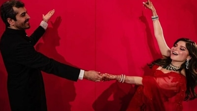 Kanika Kapoor and Gautam Hathiramani at their wedding reception in London. Kanika Kapoor and Gautam Hathiramani at their wedding reception in London.
