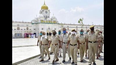 Punjab Police personnel on patrol outside the Golden Temple ahead of Operation Bluestar anniversary in Amritsar. The state police are on alert in view of the anniversary on June 6. (Sameer Sehgal/HT file)