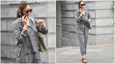 In the end, Kareena chose sleeked back high ponytail, glowing skin, nude lip shade and blushed cheeks for the glam picks. Minimal makeup and simple accessories made her pyjama suit set even more stylish and perfect for chilling in this warm weather. What do you think of Kareena's look? (HT Photo/Varinder Chawla) In the end, Kareena chose sleeked back high ponytail, glowing skin, nude lip shade and blushed cheeks for the glam picks. Minimal makeup and simple accessories made her pyjama suit set even more stylish and perfect for chilling in this warm weather. What do you think of Kareena's look? (HT Photo/Varinder Chawla)