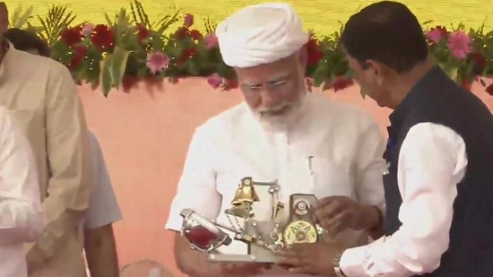 Modi was elected to serve as Gujarat's CM for the fourth time in 2012. He often refers to his administrative experience in Gujarat while recalling his political journey.(ANI)