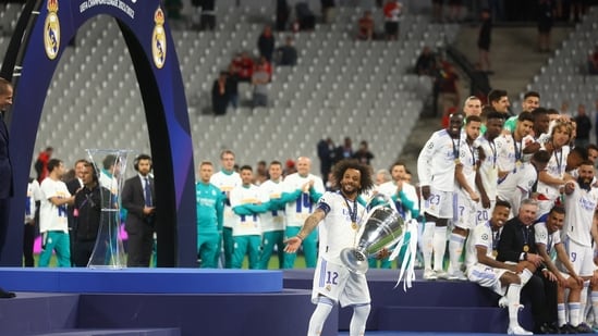Champions League Final 2022 Highlights: Real Madrid's Marcelo gestures to the fans as he carries the trophy to the presentation area