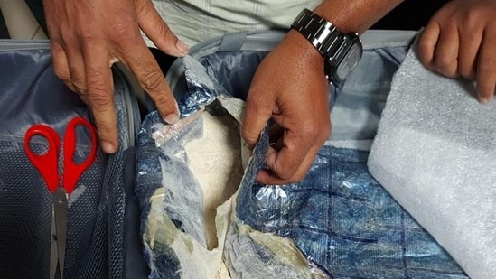 Heroin was concealed in the false bottom of a suitcase of a passenger at Kempegowda International Airport, Bengaluru.