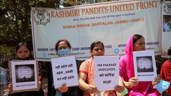 Kashmiri Pandit employees have been holding sit-in protests across Kashmir while boycotting their duties. (ANI) Kashmiri Pandit employees have been holding sit-in protests across Kashmir while boycotting their duties. (ANI)