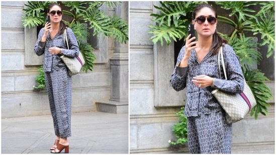 Paparazzi clicked Kareena outside her father, Randhir Kapoor's house in Mumbai. The star looked stylish in a grey coordinated top and pants set for the occasion. It comes adorned with a quirky geometric pattern in white shade, and Kareena teamed it with a printed Gucci tote bag with a similar design.(HT Photo/Varinder Chawla)