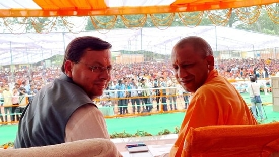 Uttarakhand CM holds roadshow with Yogi Adityanath (Twitter/@@pushkardhami)