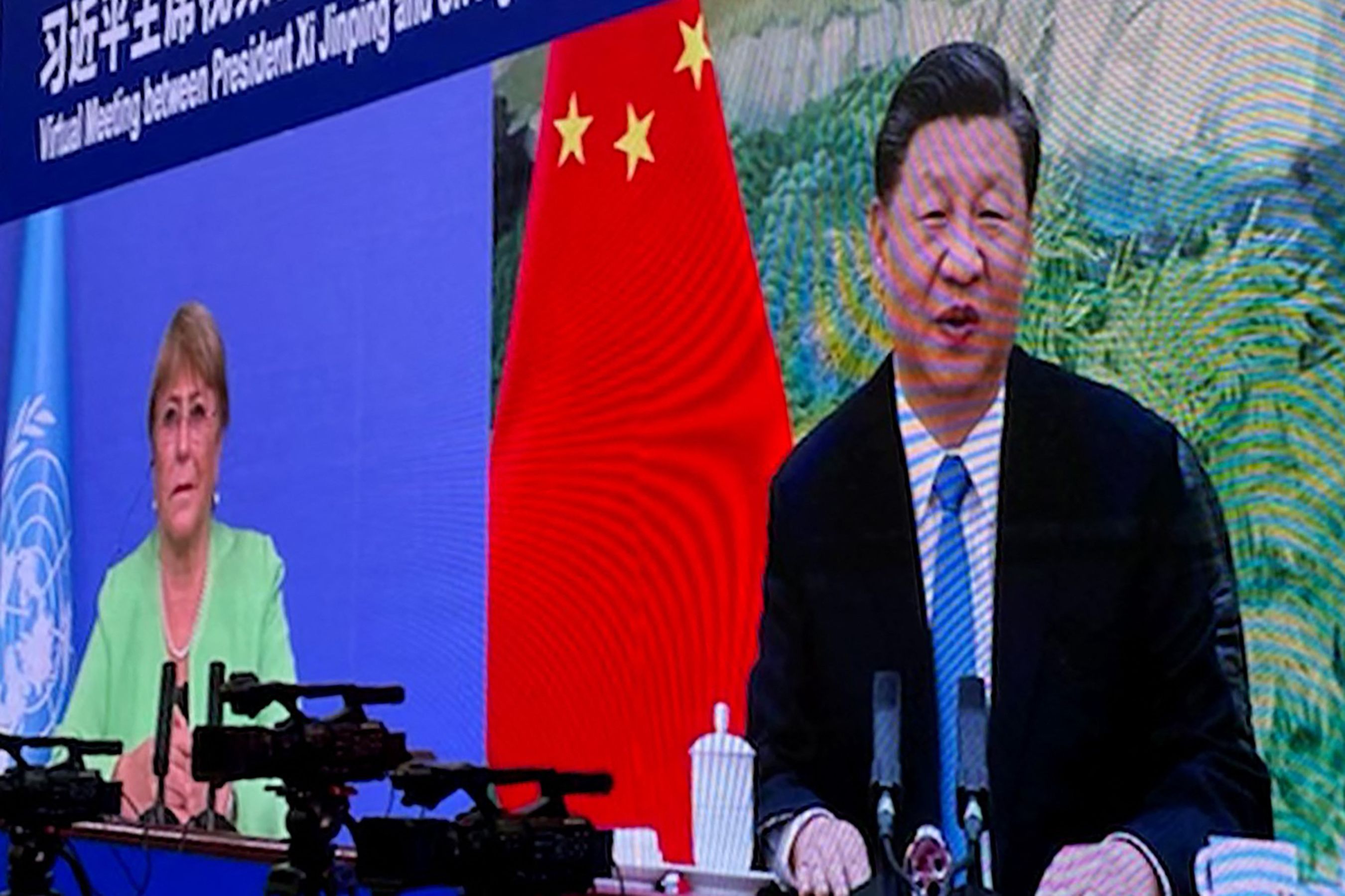 This file handout image taken and released by the Office of the OHCHR shows a screen of UN human rights chief Michelle Bachelet attending a virtual meeting with China's President Xi Jinping, in Guangzhou. (AFP) This file handout image taken and released by the Office of the OHCHR shows a screen of UN human rights chief Michelle Bachelet attending a virtual meeting with China's President Xi Jinping, in Guangzhou. (AFP)