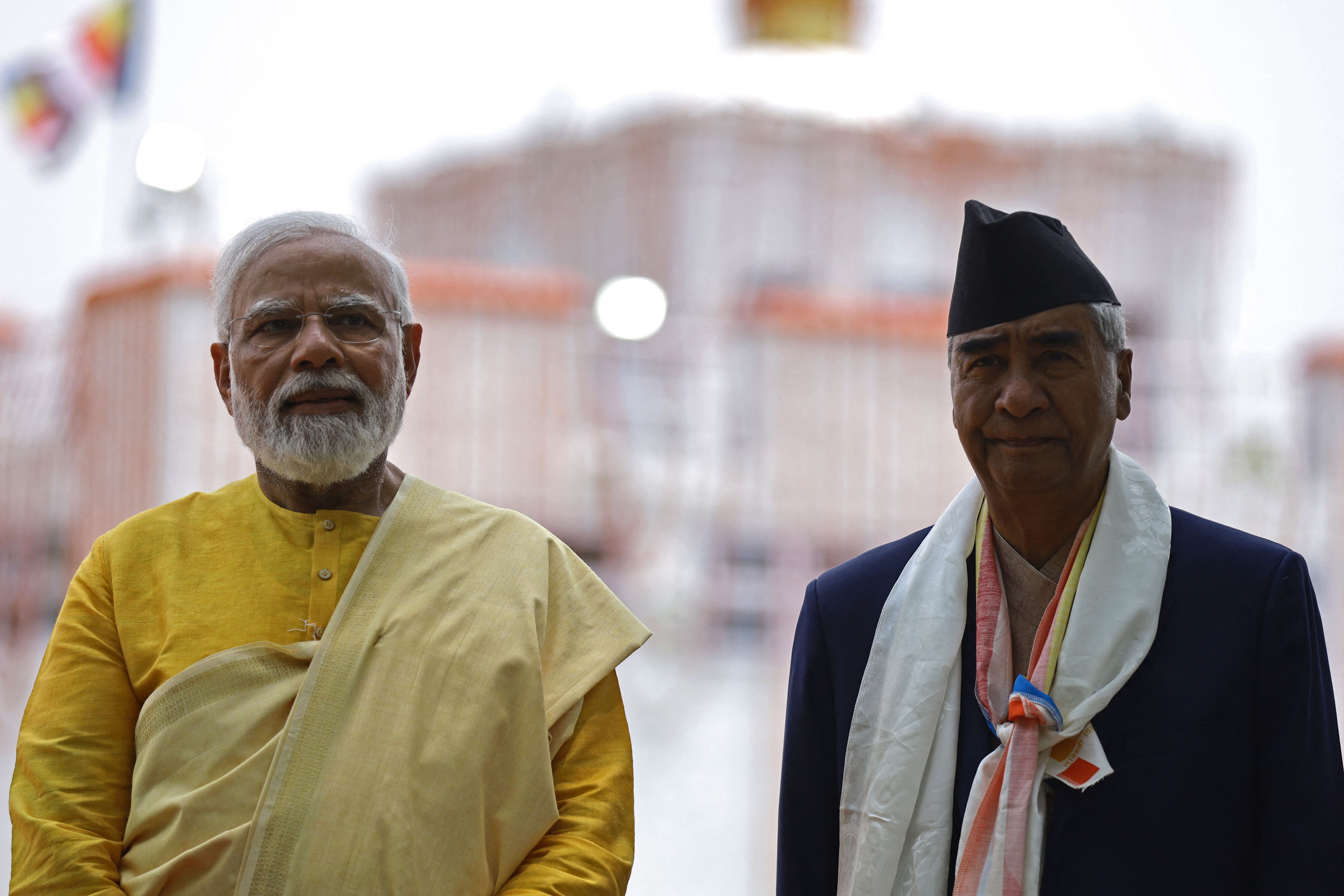 File photo of Nepal's PM Sher Bahadur Deuba with his Indian counterpart Narendra Modi in Lumbini. (AFP)