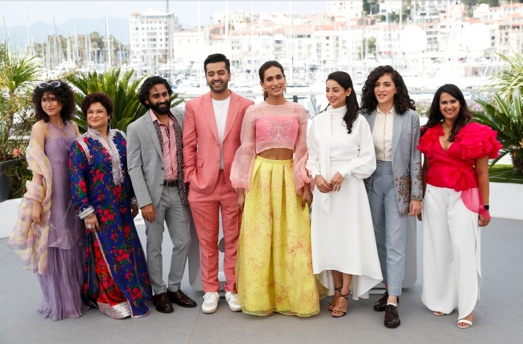 Director Saim Sadiq, cast members Alina Khan, Ali Junejo, Sarwat Gilani, Sania Saeed, Rasti Farooq and producers Apoorva Guru Charan and Sana Jafri pose in Cannes. ((Stephane Mahe/Reuters)) Director Saim Sadiq, cast members Alina Khan, Ali Junejo, Sarwat Gilani, Sania Saeed, Rasti Farooq and producers Apoorva Guru Charan and Sana Jafri pose in Cannes. ((Stephane Mahe/Reuters))