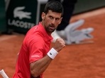 Serbia's Novak Djokovic celebrates his win against Argentina's Diego Schwartzman in three sets, 6-1, 6-3, 6-3, in their fourth round match at the French Open.