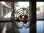 The United Nations logo is seen on a window in an empty hallway at United Nations headquarters. (File image)