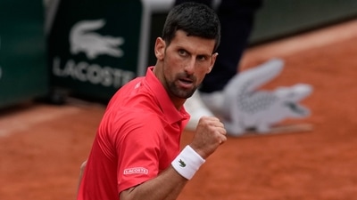 Serbia's Novak Djokovic celebrates his win against Argentina's Diego Schwartzman in three sets, 6-1, 6-3, 6-3, in their fourth round match at the French Open. (AP) Serbia's Novak Djokovic celebrates his win against Argentina's Diego Schwartzman in three sets, 6-1, 6-3, 6-3, in their fourth round match at the French Open. (AP)