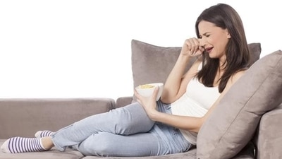 1. Mood Swings: The progesterone levels increase after the ovulation phase of the menstrual cycle. This sudden rise can induce depressive feelings in women as estrogen and progesterone hormones are linked to mood and behaviour. One will be frustrated, agitated, aggressive, stressed, anxious, restless, impatient, or angry. Various studies also suggest that these hormones affect the amygdala part of the brain responsible for flight and fight responses. A hyperactive amygdala can cause sadness or a bad mood. Mood swings are a sign of Premenstrual Syndrome (PMS) or Premenstrual Dysphoric Disorder (PDD) and will make it difficult for you to do your daily activity with ease due to hormonal imbalance. Even unhealthy cravings can set in. (Shutterstock) 1. Mood Swings: The progesterone levels increase after the ovulation phase of the menstrual cycle. This sudden rise can induce depressive feelings in women as estrogen and progesterone hormones are linked to mood and behaviour. One will be frustrated, agitated, aggressive, stressed, anxious, restless, impatient, or angry. Various studies also suggest that these hormones affect the amygdala part of the brain responsible for flight and fight responses. A hyperactive amygdala can cause sadness or a bad mood. Mood swings are a sign of Premenstrual Syndrome (PMS) or Premenstrual Dysphoric Disorder (PDD) and will make it difficult for you to do your daily activity with ease due to hormonal imbalance. Even unhealthy cravings can set in. (Shutterstock)
