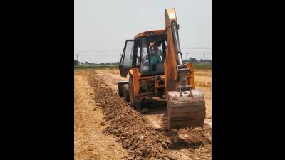 The firm, Ashoka Buildcon Limited, which was awarded the contract, has started levelling land in Rurki, Pukhta, Sahauran and Nagiara villages. (HT Photo) The firm, Ashoka Buildcon Limited, which was awarded the contract, has started levelling land in Rurki, Pukhta, Sahauran and Nagiara villages. (HT Photo)