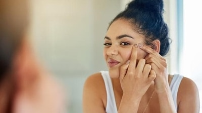 Periods will not only impact your physical health but even mental well-being. In an interview with HT Lifestyle, Dr Pavan Devendra Bendale, Fertility Consultant at Pune's Nova IVF, told Zarafshan Shiraz, “It is that time of the month when a woman will notice a variety of symptoms right from acne breakouts, fatigue, cramps, mood swings, irritability and stress due to hormonal imbalance. Two essential hormones progesterone and estrogen are crucial for menstruation and their levels will keep changing throughout periods.” He revealed 3 ways in which menstruation takes a toll on the mental health that in turn is related to problems in getting pregnant and can impact your fertility: (Getty Images) Periods will not only impact your physical health but even mental well-being. In an interview with HT Lifestyle, Dr Pavan Devendra Bendale, Fertility Consultant at Pune's Nova IVF, told Zarafshan Shiraz, “It is that time of the month when a woman will notice a variety of symptoms right from acne breakouts, fatigue, cramps, mood swings, irritability and stress due to hormonal imbalance. Two essential hormones progesterone and estrogen are crucial for menstruation and their levels will keep changing throughout periods.” He revealed 3 ways in which menstruation takes a toll on the mental health that in turn is related to problems in getting pregnant and can impact your fertility: (Getty Images)