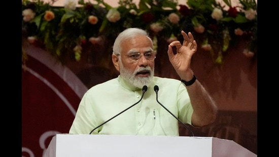 Prime Minister Narendra Modi addresses a conclave on the co-operative sector in Gandhinagar, May 28, 2022 (AP)
